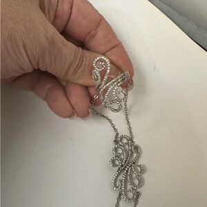 Elegant Silver Swirl ring 
With bracelet Hand Chain Bracelet silver